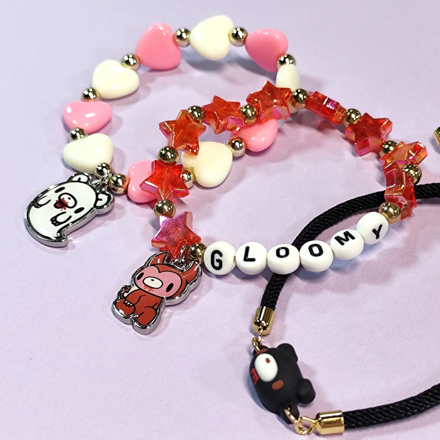 Three - piece bracelet set. Colorful beads, cute animal charms (bear, fox), playful designs. Ideal sweet accessories.