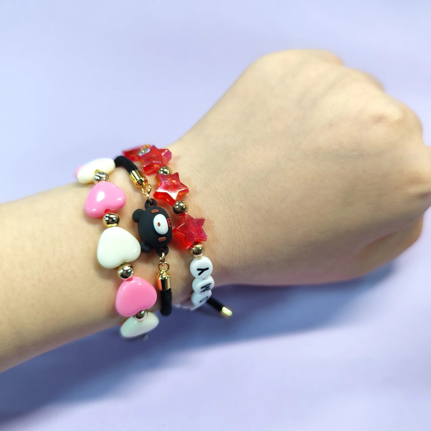 Three - piece bracelet set. Colorful beads, cute animal charms (bear, fox), playful designs. Ideal sweet accessories.