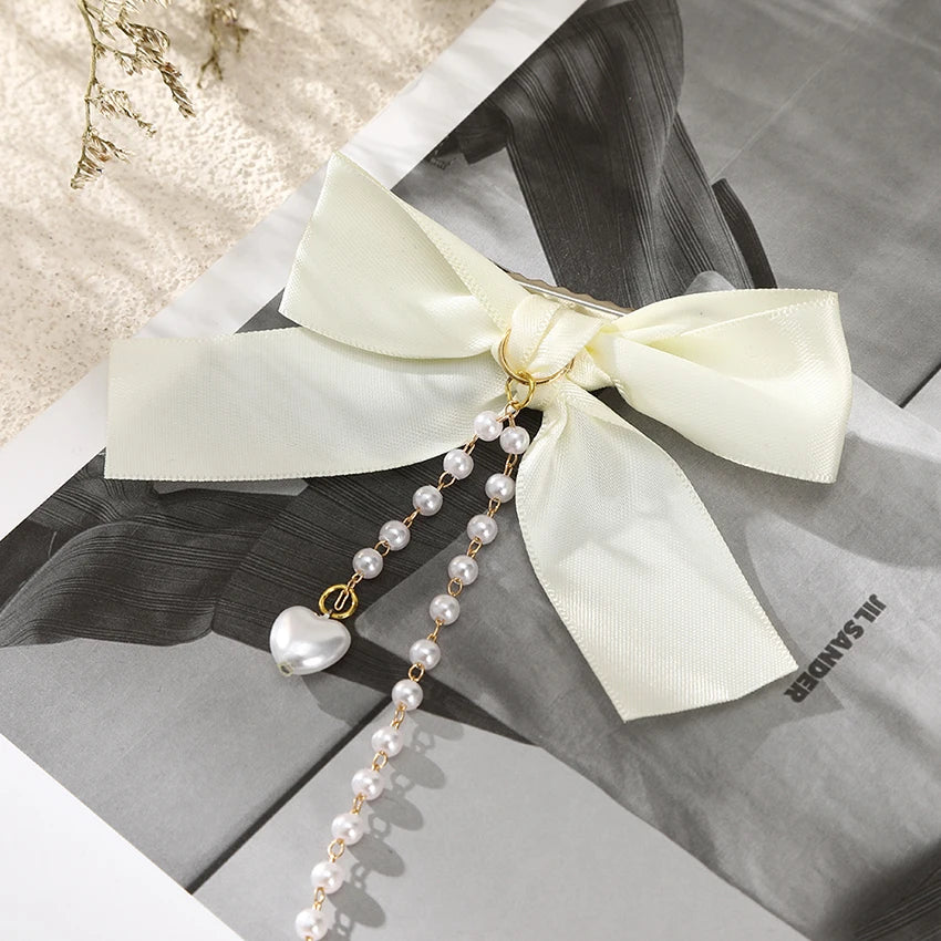 LEVAO Women's Sweet Double Bow Duckbill Clip Tiaras Pearl Chain Decorative Hairband Girls Fashion Hairpin Hair Accessories