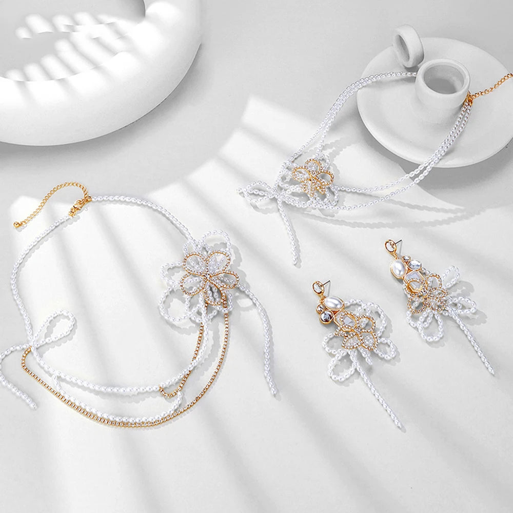 Fairy Beauty White Hollow Flower Necklace Female Dream Wedding Exaggerated Bow Pearl Beaded Earrings Jewelry