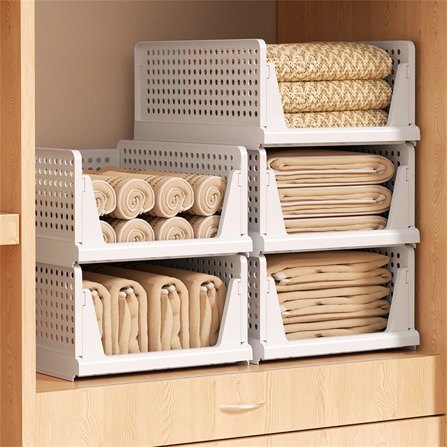 Clothes storage baskets can be stacked with drawer storage baskets, wardrobes, layered partitions, and pull-out folding storage