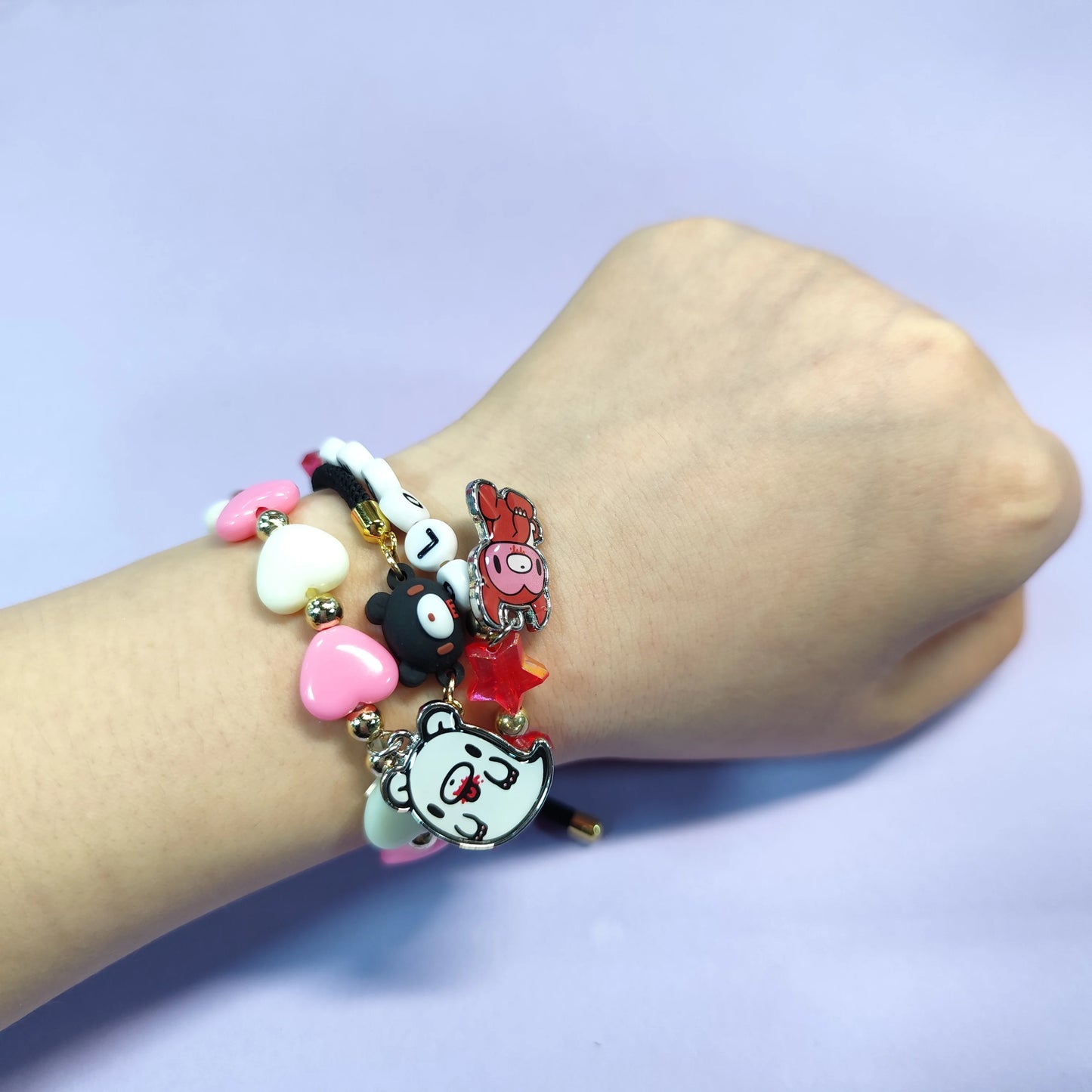 Three - piece bracelet set. Colorful beads, cute animal charms (bear, fox), playful designs. Ideal sweet accessories.