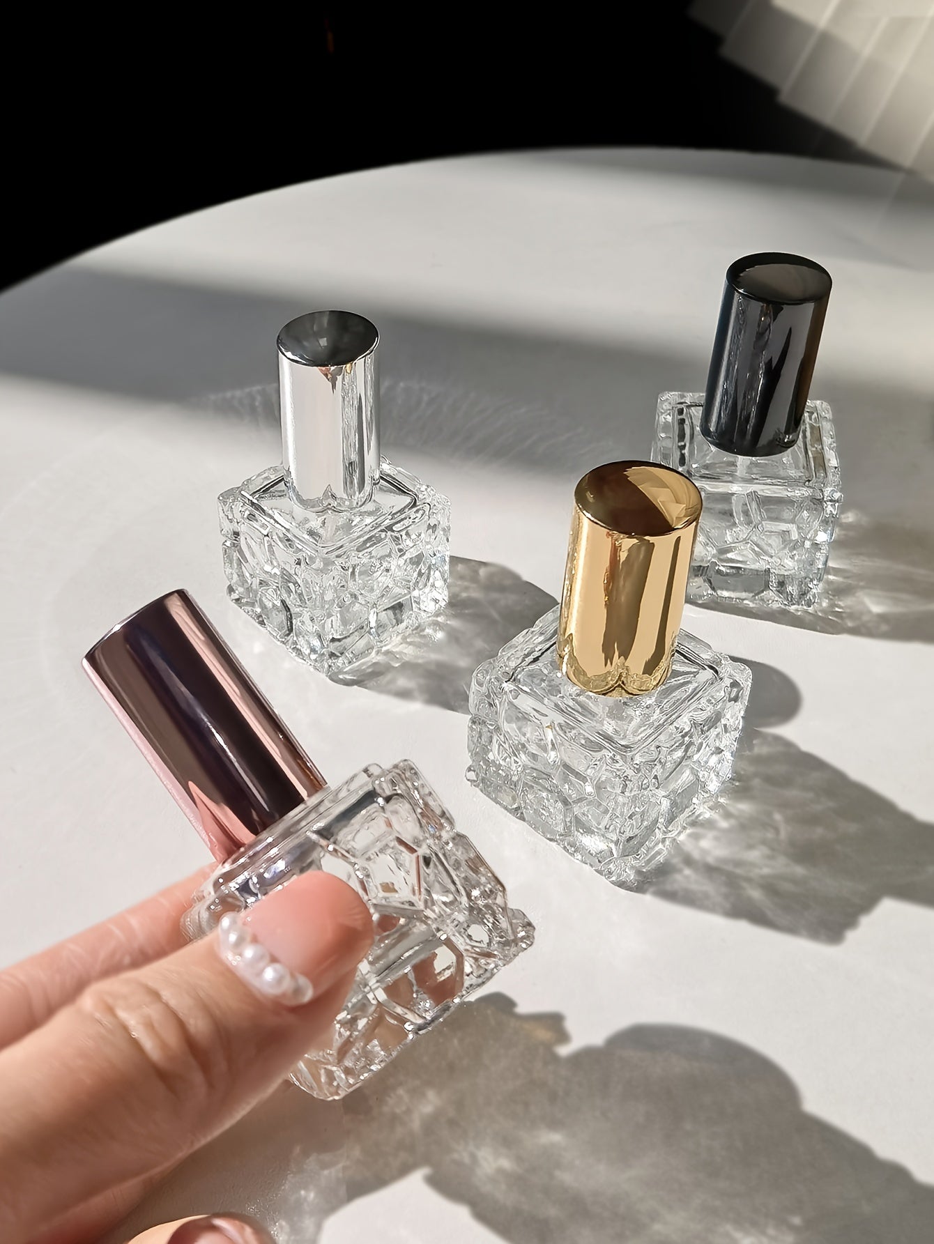 4-Pack 10ml Square Textured Glass Perfume Bottles, Portable Mini Spray Atomizer, Refillable, Travel-Friendly, with Fine Mist Sprayer, Elegant Personal Fragrance Vial, Assorted Metallic Caps