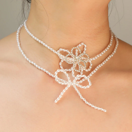Fairy Beauty White Hollow Flower Necklace Female Dream Wedding Exaggerated Bow Pearl Beaded Earrings Jewelry